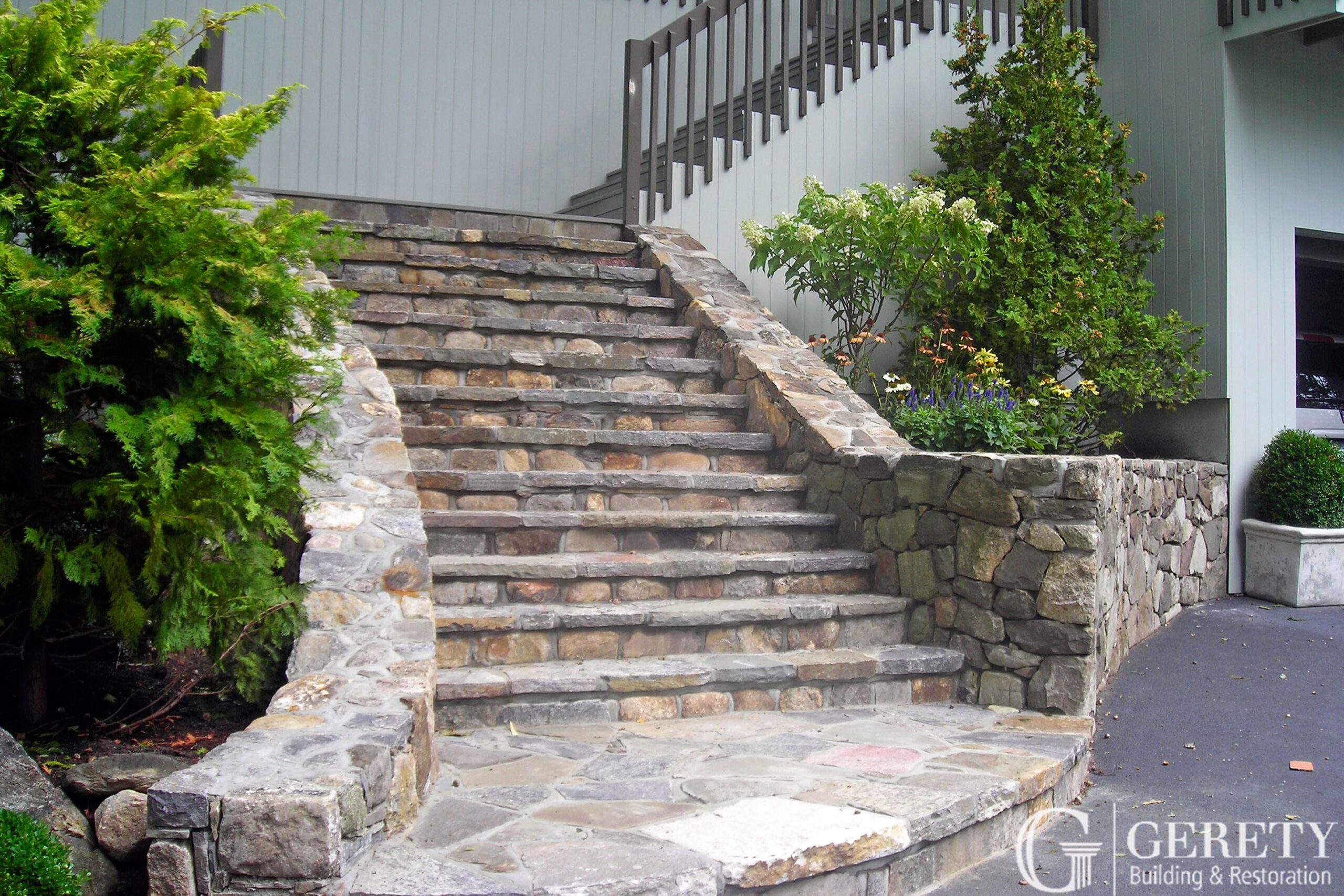 STONE-STEPS-WITH-LANDING-AND-WALLS-scaled.jpg